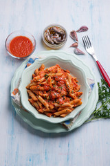 pasta with tuna  anchovyand tomatoes sauce