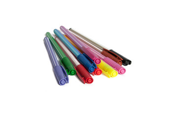 colorful isolated pens or markers on white