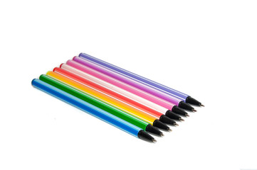 colorful isolated pens or markers on white