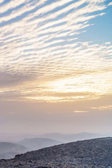 Fototapeta na wymiar Vertical photo magic morning orange sunrise dawn over holy land judean desert in Israel