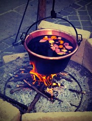hot mulled WINE on the big cauldron with vintage effect