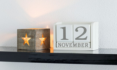 White block calendar present date 12 and month November
