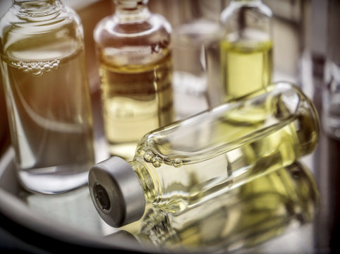 Several ampoules and vials in a tray of a hospital, palliative care, conceptual image