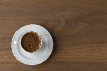 white cup and coffee