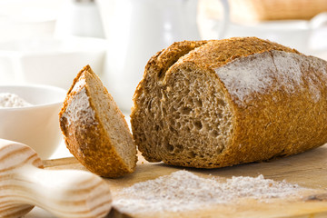 Homemade whole wheat bread on a cutting board