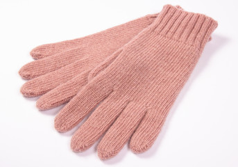 Winter, woolen gloves on a white background.