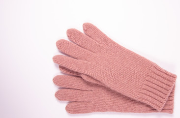 Winter, woolen gloves on a white background.