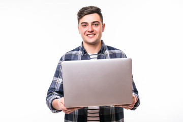 Young handsome man with laptop on white background