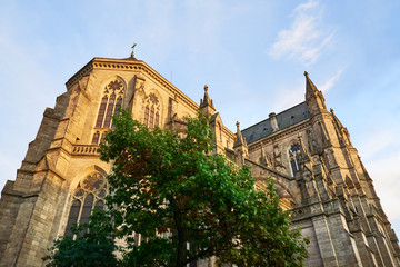 Obraz premium St Aubin Church in the city center of Rennes city, Brittany region of France. People on the street