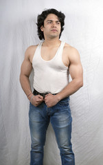 young  male model in white vest