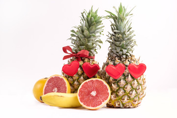 Two Ripe Pineapples on White Background Ripe Juicy Tropical Fruits Grapefruit St Valentines Day Food Concept Copy space