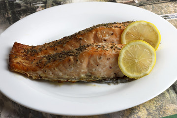 Fried salmon steaks on a plate