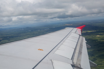 Fototapeta na wymiar Airplane wing window view