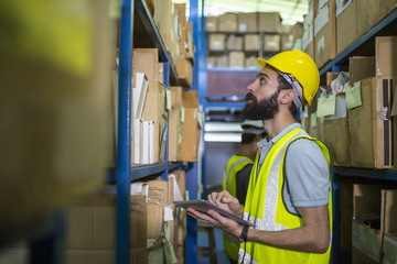 Warehouse worker checking stock products