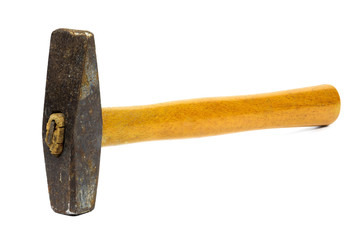 Old rusty hammer on white background