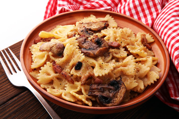 Italian pasta with fugi, farfalle fresh vegetables - cuisine