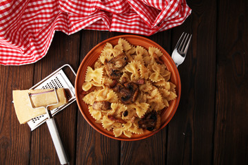 Italian pasta with fugi, farfalle fresh vegetables - cuisine