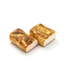 salted pork fat over white background