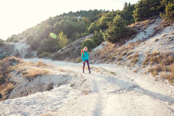 A girl with a backpack.