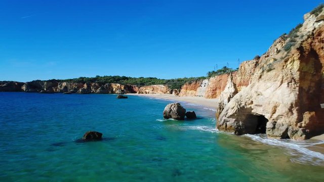 Aerial view of the Alemao Beach in Portimao, Algarve, Portugal; Concept for travel in Portugal and summer vacations in Portugal