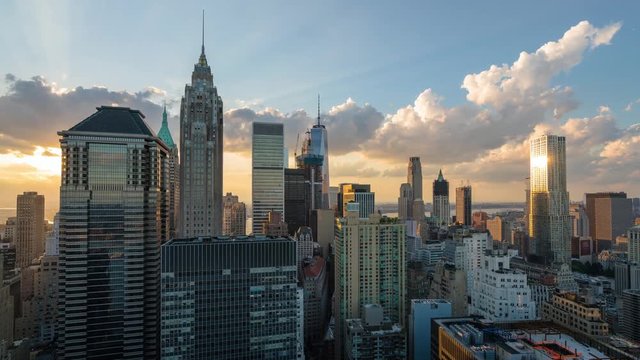 Panning motion timelapse Downtown Manhattan Skyline with storm clouds rolling in.