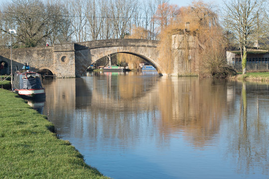Ancient bridge reflected in the Thames