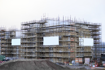 Large scaffolding on building construction site tall scaffold system