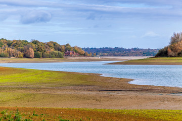 valley of Bewl river in Kent, England during autumn on a cloudy day