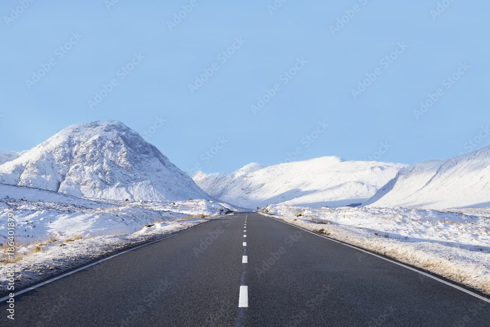 Wall mural empty wide road blank horizon in glencoe scotland