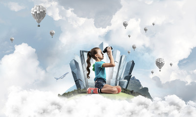 Concept of careless happy childhood with girl looking in future