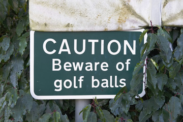 Beware Golf Balls Sign on Club Course Warning to the Public
