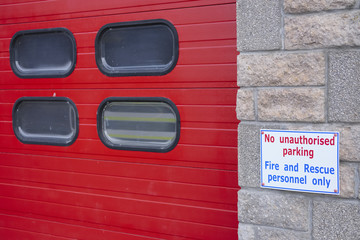 Fireman and emergency services staff car parking only sign