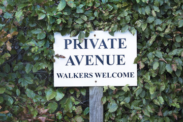 Walkers welcome sign in countryside private avenue