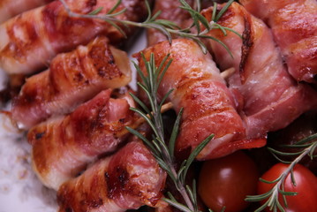 Chicken meat wrapped in bacon