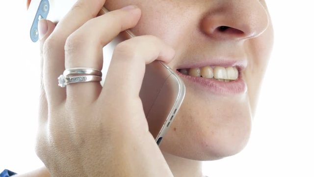 Closeup 4k footage of femaly mouth while talking by cell phone