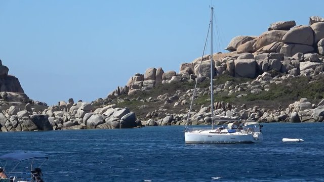 Beautiful Archipelago with Sailing Yachts on Anchorage filmed from motorboat