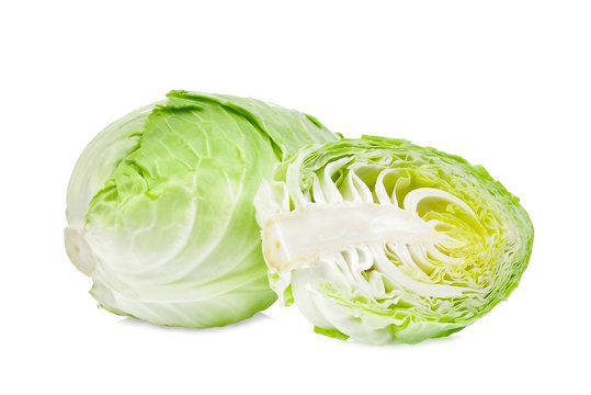 green pointed cabbage with half isolated on white background