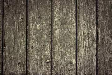 Old dark weathered distressed damaged stained grunge wood grain planked wall rustic background texture photo