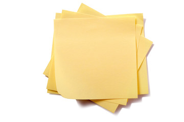 Untidy pile stack square yellow sticky post it note isolated on white background photo
