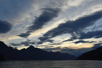 Dramatic sunset over Lake Wakatipu, Queenstown New Zealand