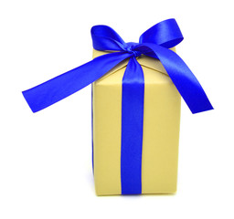 Yellow gift box with blue ribbon on white