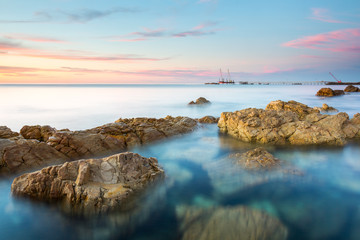 Osullivan Beach at sunset next the old refinery fence line