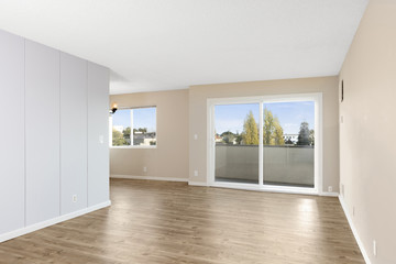 Living Room interior after remodelling with Balcony and wooden floor.