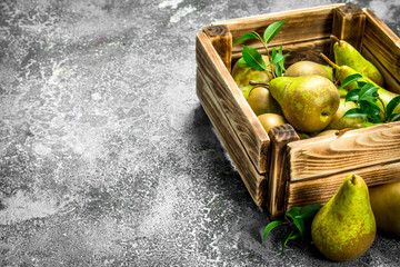 Fresh pears in a box.