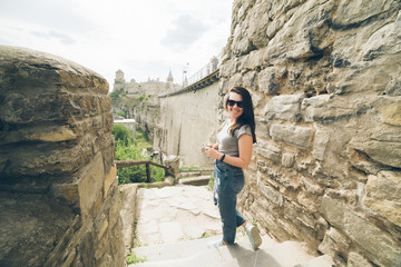 yang pretty woman tourist in front of castle