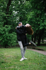 lovely cople  running and play in the park
