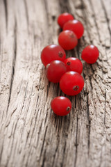 Cranberries close-up on old wood