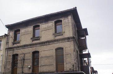 Old brick facade building in the center of the city