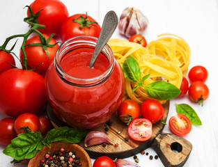 Jar with tomato sauce