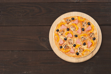 pizza on a wooden background
